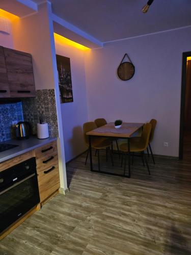 Kuchyň nebo kuchyňský kout v ubytování Apartamenty i Pokoje Koleczkowo