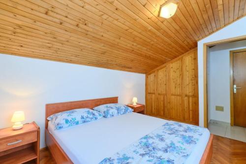 Postel nebo postele na pokoji v ubytování Apartment Luce