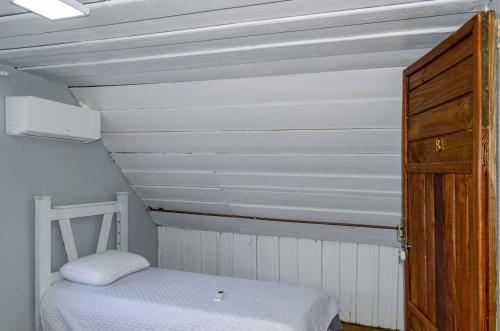 Katil atau katil-katil dalam bilik di Refugio na natureza com Wi-Fi e churrasqueira