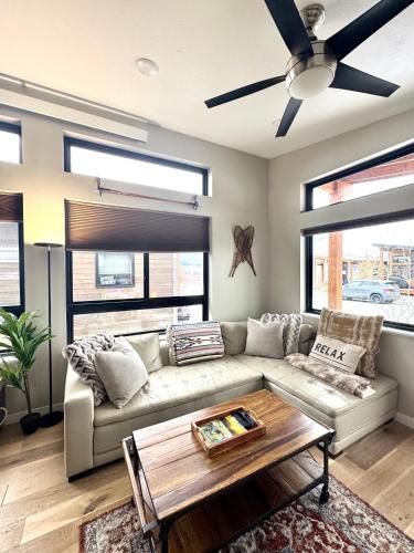 a living room with a couch and a table at Cozy 2 Bedroom by Teton Pass in Victor