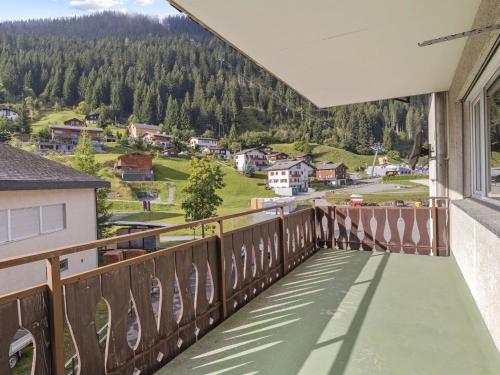 a balcony with a view of the mountains at Apartment Seeli by Interhome in Churwalden