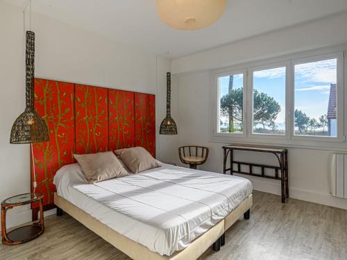 Posteľ alebo postele v izbe v ubytovaní Apartment La Voilerie - Hartimon by Interhome