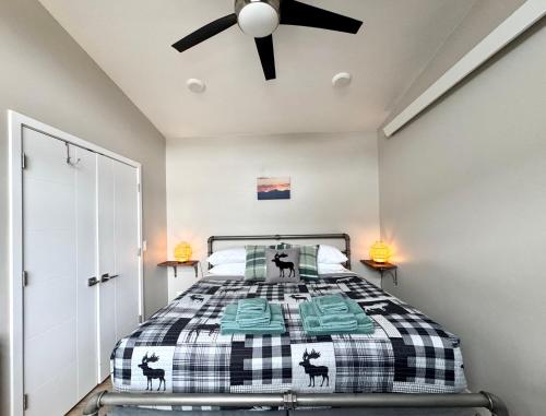 a bedroom with a bed and a ceiling fan at Cozy 2 Bedroom by Teton Pass in Victor