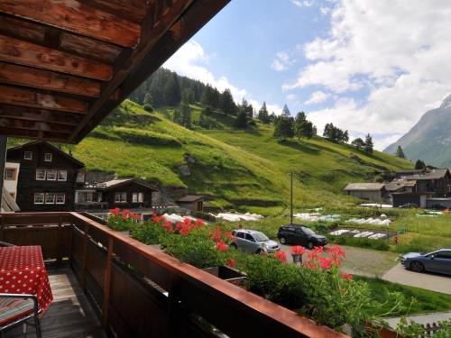 a balcony with a view of a mountain at Apartment Wiedersehen by Interhome in Saas-Grund