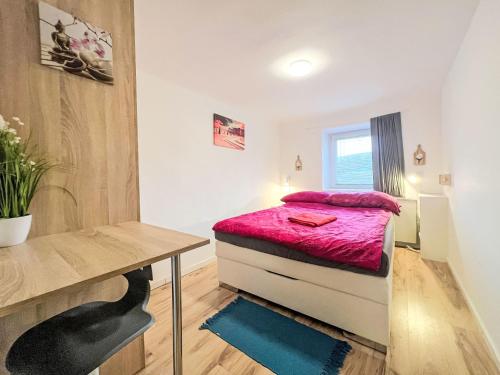 Ένα ή περισσότερα κρεβάτια σε δωμάτιο στο Apartment Garden Suite by Interhome