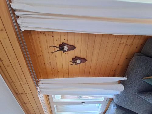 two bees on the ceiling of a room at Apartment Bergluft by Interhome in Zweisimmen