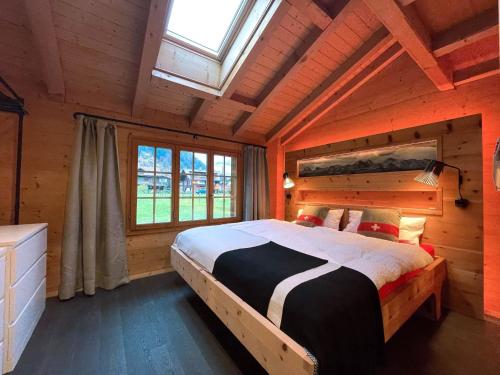 Postel nebo postele na pokoji v ubytování Apartment Cozy Chalet by Interhome
