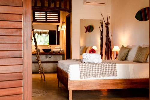 a bedroom with a bed in a room at A Piscina Itaca in Barrinha