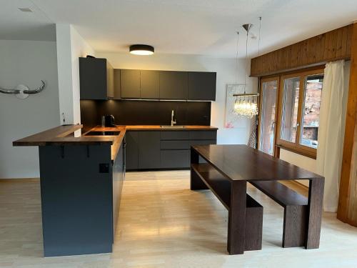 Kuchyň nebo kuchyňský kout v ubytování Apartment Rothenbach by Interhome