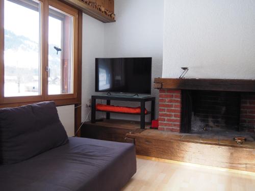 TV a/nebo společenská místnost v ubytování Apartment Rothenbach by Interhome