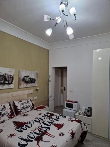 Кровать или кровати в номере Affittacamere Cecco Rooms