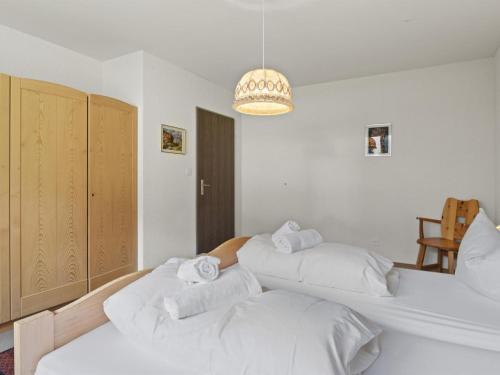 Postel nebo postele na pokoji v ubytování Apartment Triangel D Grossenberger by Interhome
