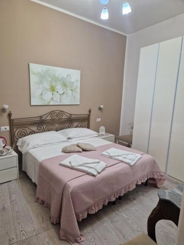 Кровать или кровати в номере Affittacamere Cecco Rooms
