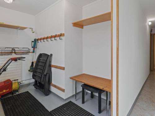 a home office with a desk and a chair at Apartment van der Meij by Interhome in Churwalden