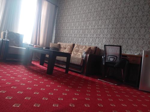 Zona de estar de Sam HOTEL