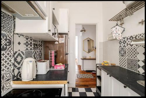 Una cocina o zona de cocina en Paris en 10 min, T3 dans le centre ville de Puteaux