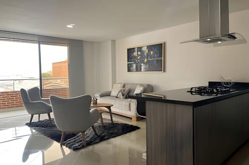 Moderno Apt. Balcón con vista, rápido WiFi y ACにあるキッチンまたは簡易キッチン