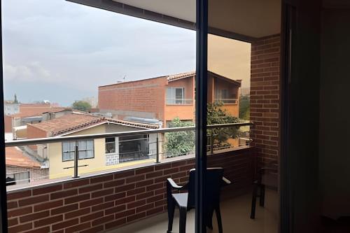 Moderno Apt. Balcón con vista, rápido WiFi y ACにあるバルコニーまたはテラス
