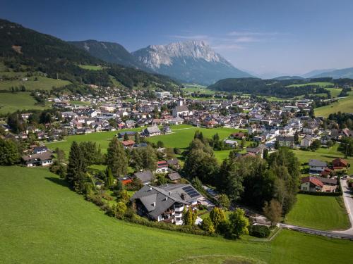 an aerial view of a small town in the mountains at Landhaus St. Georg in Gröbming