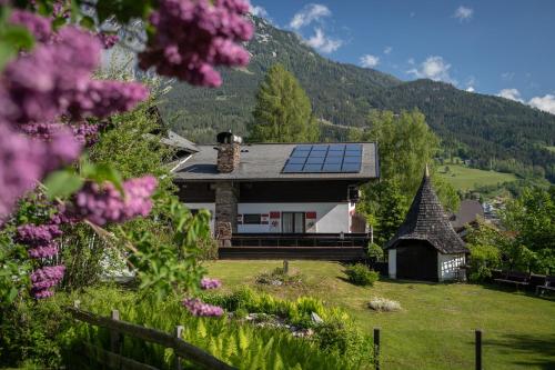 a house with solar panels on the roof at Landhaus St. Georg in Gröbming