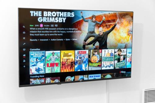 a poster for the brothers grimsby movie on a wall at Modern Apartment - Accommodates 4 - On Street Parking Available 2CR in Birmingham