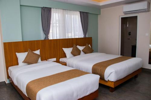 Lova arba lovos apgyvendinimo įstaigoje Bay Hotel