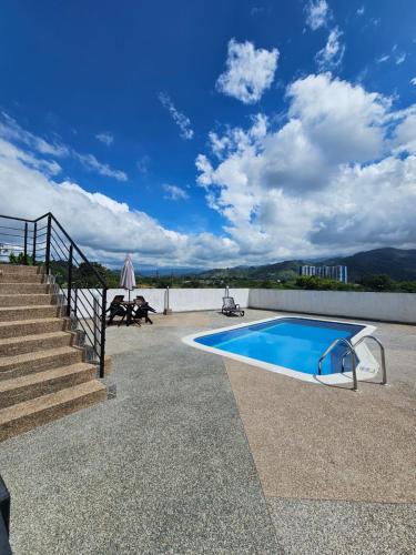 Πισίνα στο ή κοντά στο OroNegroApartaHoteles Espectacular Apartaestudio Amoblado Armenia, Quindio