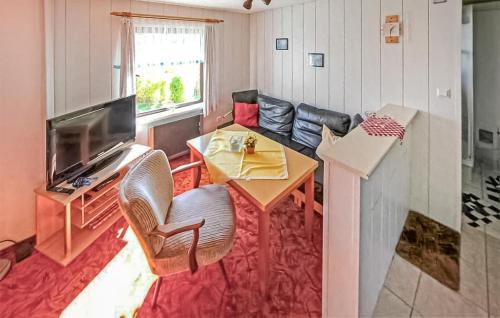 Μια τηλεόραση ή/και κέντρο ψυχαγωγίας στο Ferienwohnung Korswandtusedom