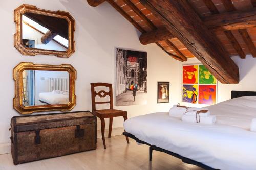 En eller flere senge i et værelse på Casa Gep - Ponte San Michele