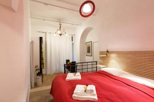 Un pat sau paturi într-o cameră la Enjoy your stay - Navona Square Apt