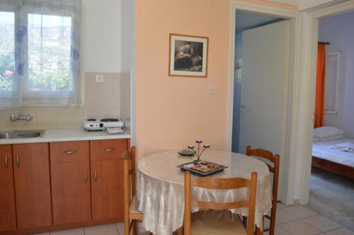 Postel nebo postele na pokoji v ubytování Elli Studios & Apartments