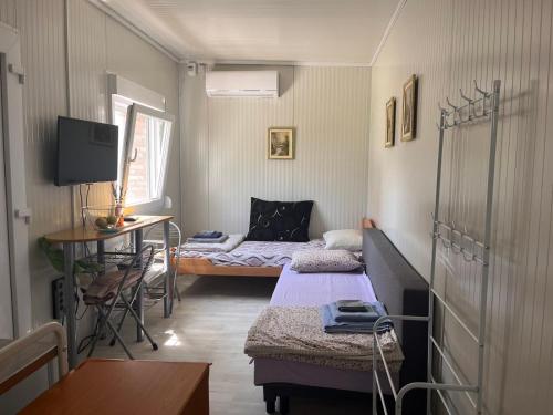 Postel nebo postele na pokoji v ubytování Apartman255