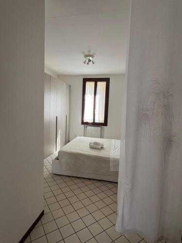 Ένα ή περισσότερα κρεβάτια σε δωμάτιο στο Residence Porta Saragozza