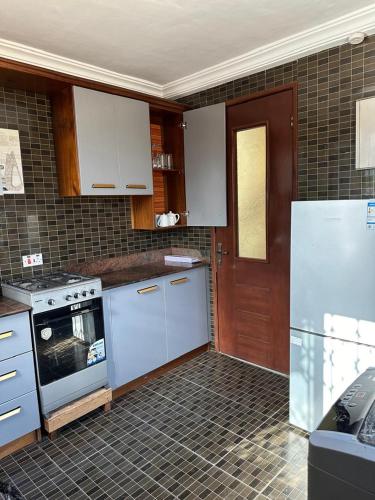 Η κουζίνα ή μικρή κουζίνα στο Prime Accra 2 Bedroom Townhouse