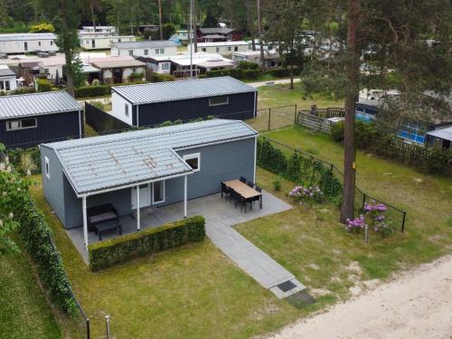 an overhead view of a house with a solar roof at Easy Chalet in Vessem