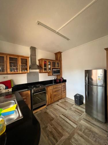 Una cocina o zona de cocina en Kays Residence