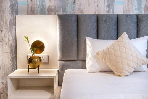 Postel nebo postele na pokoji v ubytování Viarch Stays - City Park At City Centre