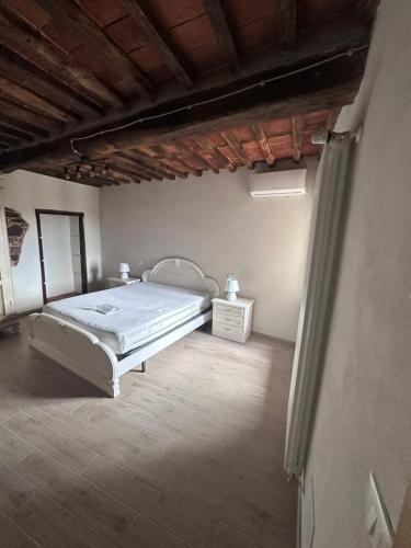 Ένα ή περισσότερα κρεβάτια σε δωμάτιο στο Casa vacanze La Tosca