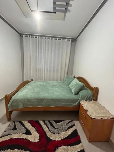 Apartment in Houceima, Ajdirにあるベッド