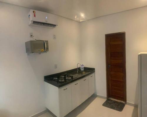 Η κουζίνα ή μικρή κουζίνα στο Loft padrão A Nº1