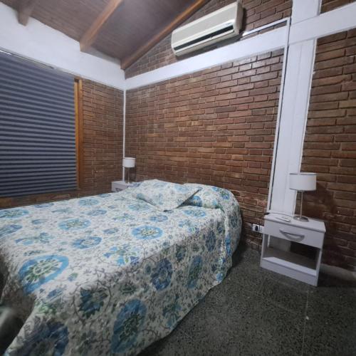 Ένα ή περισσότερα κρεβάτια σε δωμάτιο στο Mendoza