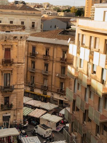 an overhead view of a city street with buildings at Taga Suites in Catania