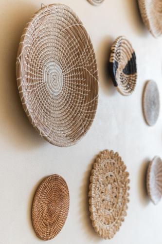 a group of brown shells on a white table at Native Residence in Rosarito