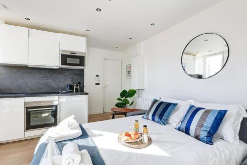 Η κουζίνα ή μικρή κουζίνα στο Suite Par ici - Superbe appartement