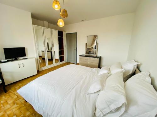 Ένα ή περισσότερα κρεβάτια σε δωμάτιο στο Maison Rosy