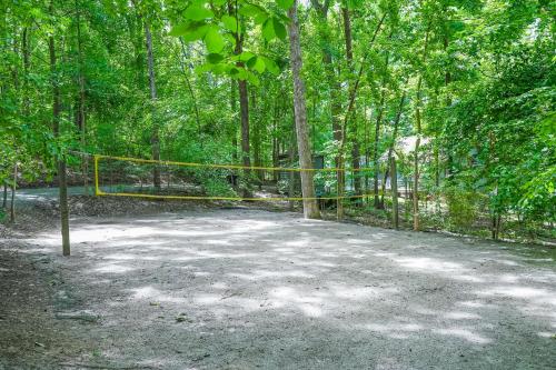 a yellow net in the middle of a forest at Cedar Hall in Bumpass