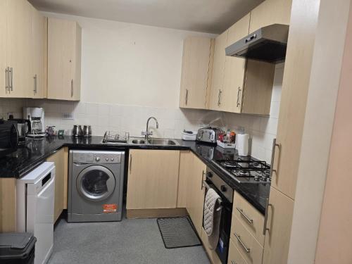 Dapur atau dapur kecil di Cranes apartments
