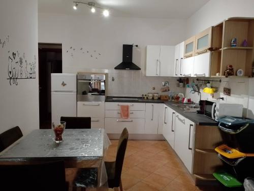 Kuchyň nebo kuchyňský kout v ubytování Cinnamon House