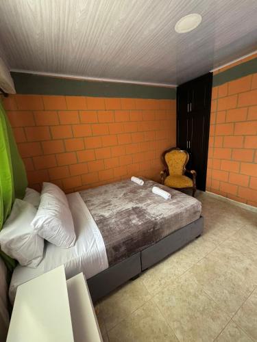 Katil atau katil-katil dalam bilik di Casa Familiar de la villa