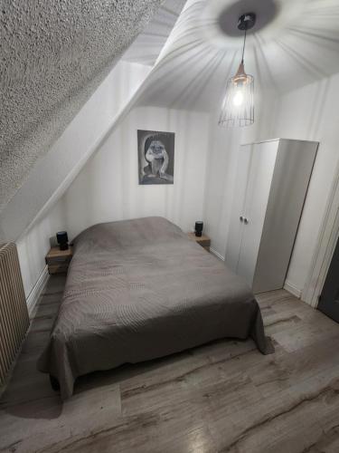 Postel nebo postele na pokoji v ubytování Gîte du logelbach